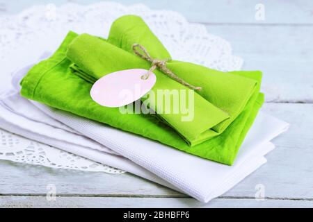 Napkins with Easter decorations  on wooden background Stock Photo