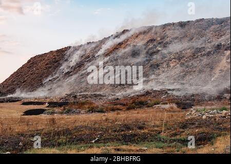 Landfill site in Bulgaria. Trash burning in a garbage dump Stock Photo