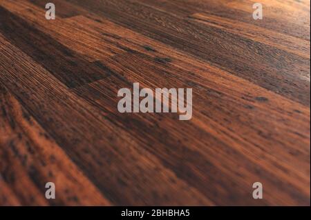 Natural dark brown wenge wood background texture Stock Photo
