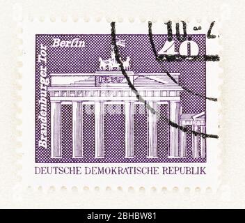SEATTLE WASHINGTON - April 23, 2020: Small format stamp featuring Berlin Brandenburg Gate, commemorating construction in DDR. Stock Photo