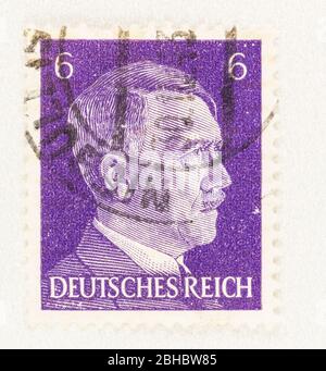 SEATTLE WASHINGTON - April 23, 2020: Purple German Reich stamp  featuring portrait of Adolf Hitler. Scott # 510 Stock Photo