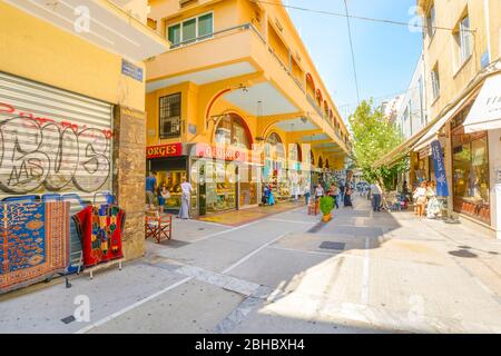 Tourists and local Greeks shop at the outdoor shopping center and marketplace near the Monastraki and Plaka district in Athens Greece Stock Photo