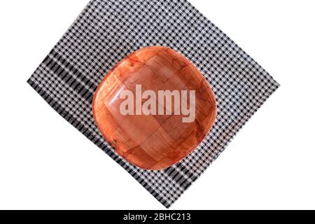 Empty bread basket on a kitchen towel. Photo with copy space. Stock Photo