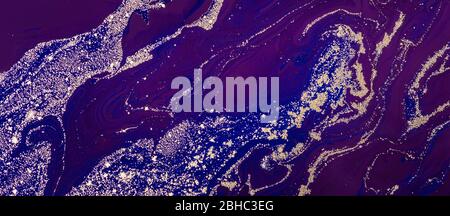 Acrylic Fluid Art. Luxury Gold sparkles Pattern and blue purple waves. Abstract Art Deco banner. Stock Photo