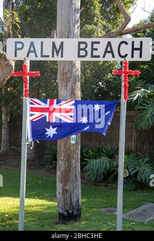 Palm Beach Sydney, Australia. COVID-19 restrictions have prevented Australian communities from holding typical marches and parades in remembrance of those Australians and New Zealanders who gave their lives in battle. In Palm Beach and across Sydney communities decorated street signs and their homes in respect. Credit Martin Berry/Alamy Live News Stock Photo