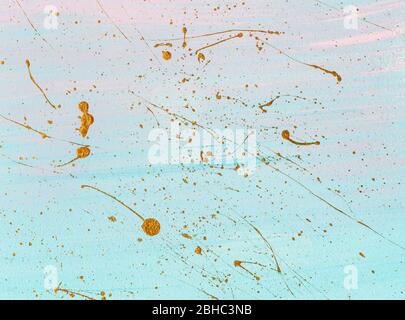 Gold splashes of different shapes on pastel background. Hand painted background or texture for your design. Stock Photo