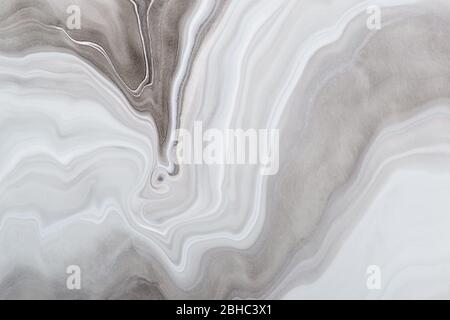 Acrylic Fluid Art. Monochrome gray waves and stains. Marble background or texture. Stock Photo