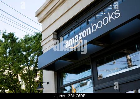 A logo sign outside of a Amazon Books retail store location in Bethesda, Maryland on April 22, 2020. Stock Photo