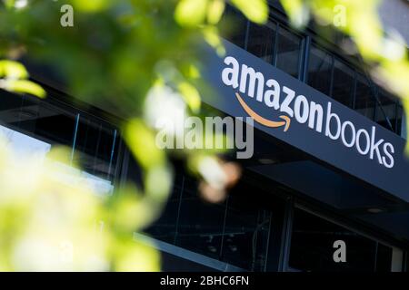 A logo sign outside of a Amazon Books retail store location in Bethesda, Maryland on April 22, 2020. Stock Photo