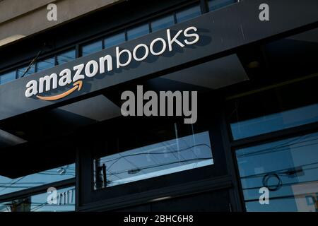 A logo sign outside of a Amazon Books retail store location in Bethesda, Maryland on April 22, 2020. Stock Photo