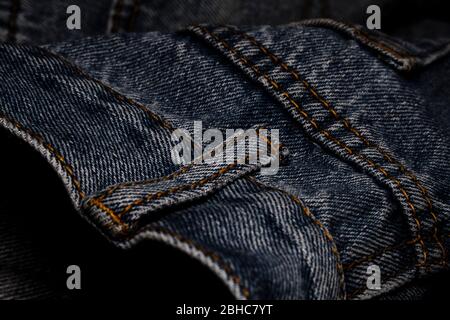 A close-up picture of crinkle blue jeans Stock Photo