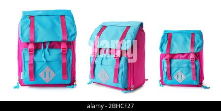 School backpacks of different sizes on white background Stock Photo