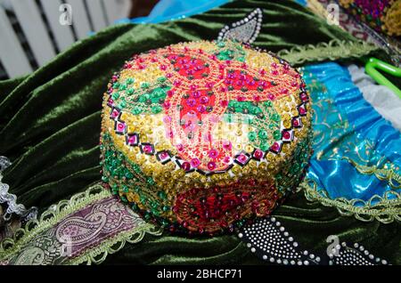 Tradional Azerbaijani souveniers hats and knitted clothing sold . They would wear a rider under the headgear hat, stroke . Araxchin is a national hood Stock Photo