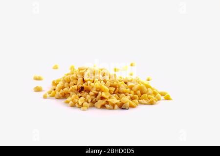 A pile of ground nuts, hazelnuts, or almonds. The nuts are suitable for baking. Stock Photo