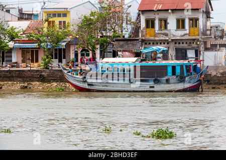 Houses, buildings and boats along the,  Mekong River ,Vietnam, Asia Stock Photo
