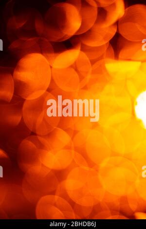 Nice abstract orange bokeh background with different lights. Stock Photo