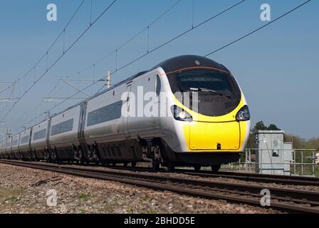 Class 390 Pendolino approaching Prestbury, Cheshire on a Manchester to London Euston service. Stock Photo