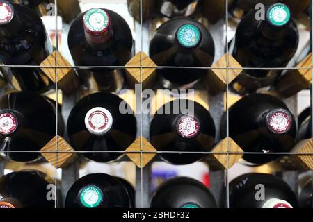 Different bottles of wine in a cellar Stock Photo