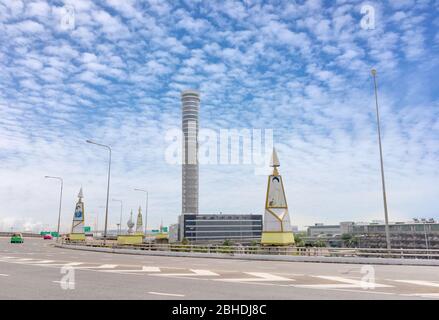 Photo of Aircraft traffic control tower of Suvarnnabhumi airpot with many street foreground and blu sky background. February 12, 2017 Stock Photo