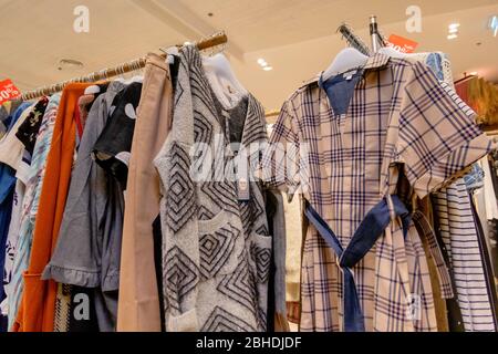 The Vintage style of women clothing hanged on the rack in Blueport shopping mall Hua Hin,Thailand February 25, 2019 Stock Photo