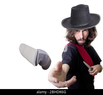 a knife thrower with long hair Stock Photo