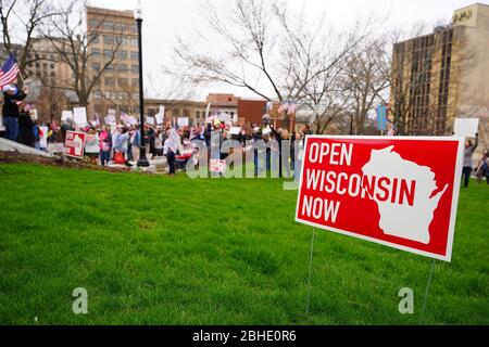 Wisconsinites rallied at the Capitol of Wisconsin protest against safer at home order due to the Coronavirus pandemic to allow the state reopen. Stock Photo