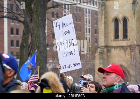 Wisconsinites rallied at the Capitol of Wisconsin protest against safer at home order due to the Coronavirus pandemic to allow the state reopen. Stock Photo