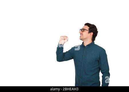 Side view of joyful businessman speaks loud, as holding an invisible imaginary megaphone or microphone in his hand isolated on white background with c Stock Photo