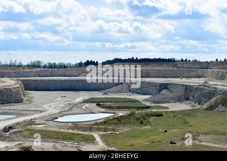 Mining, quarrying, and production of stone at a quarry. Stock Photo
