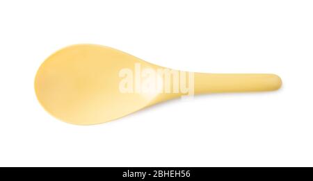 Yellow plastic spoon or ladle isolated on white background. Stock Photo