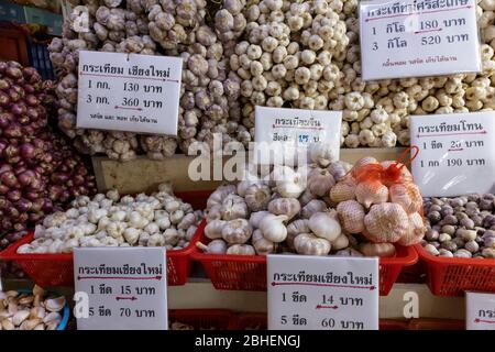 Bangkok, Thailand - March 3rd, 2020: A wide selection of garlic for sale in a market in Bangkok, Thailand Stock Photo