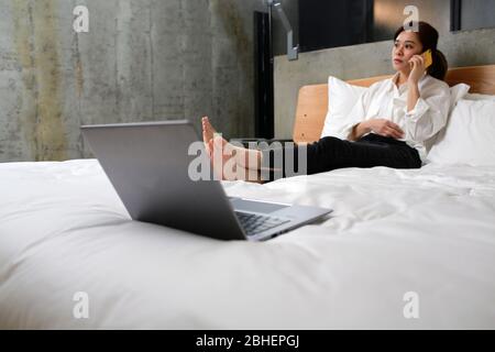 girl work at home on call Stock Photo
