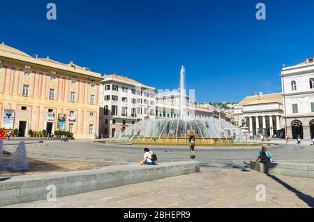 Genoa, Italy, September 11, 2018: Piazza Raffaele De Ferrari square with fountain, Palazzo Ducale Doge's Palace, Teatro Carlo Felice theatre building in historical centre of old city Genova, Liguria Stock Photo