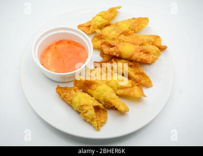 Deep Fried Won ton on white plate with dip source Stock Photo