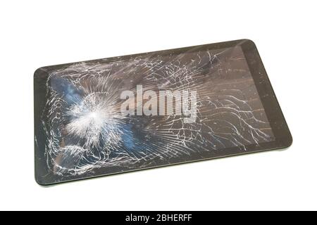 Tablet with cracked screen on a white background Stock Photo
