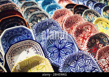 traditional handpainted oriental pottery on a market stall
