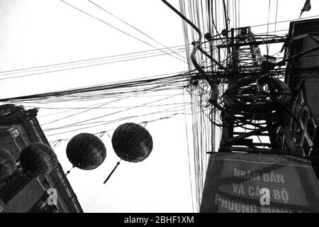 Electricity lines and lanterns in Hoi An, Vietnam Stock Photo