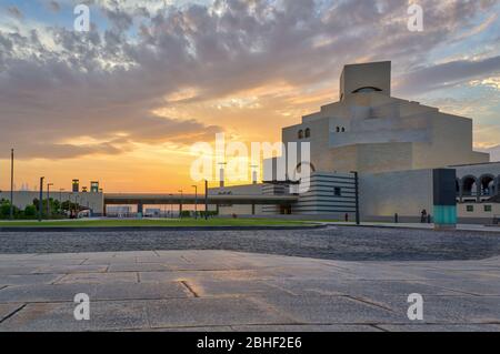 Museum of Islamic Art , Doha, Qatar  exterior view at sunset with clouds in the sky in the background Stock Photo