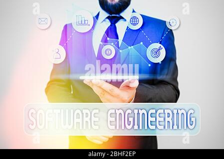 Writing note showing Software Engineering. Business concept for Program Development in Systematic Quantifiable approach Stock Photo