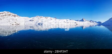 Frozen White Lake - Bernina Pass - Switzerland - Panoramic aerial view Stock Photo