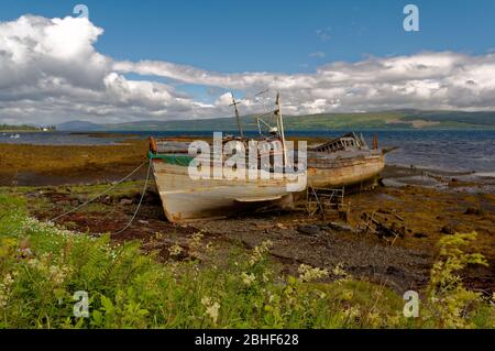 Abandoned fishing boats seen on the Isle of Mull, Scotland Stock Photo ...