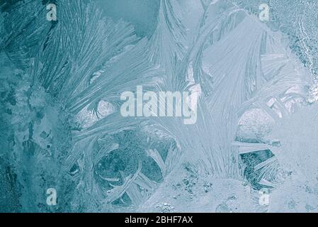 Frozen window, icy snowy glass, background or texture Stock Photo
