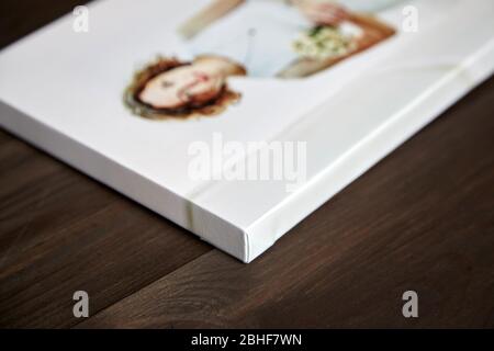 Canvas print. photo with gallery wrap method of canvas stretching on  stretcher bar. Sample of stretched color photograph printed on canvas,  lateral Stock Photo - Alamy