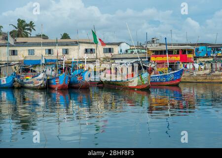 Wooden fishing boats in the fishing harbor of Elmina, Ghana. Stock Photo