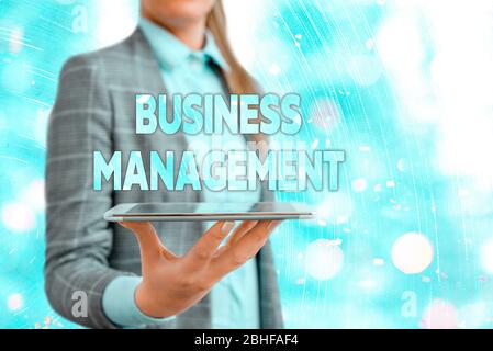 Conceptual hand writing showing Business Management. Concept meaning Overseeing Supervising Coordinating Business Operations Stock Photo