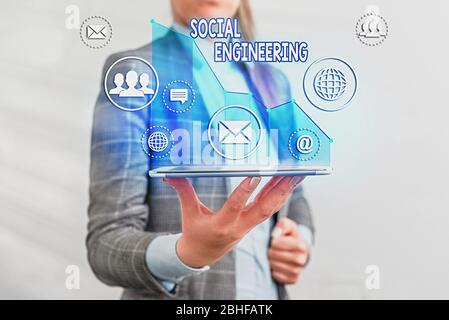 Writing note showing Social Engineering. Business concept for Psychological Manipulation Gain Access thru Fraud Stock Photo