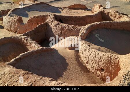 Ruins of the Ancient Mud Huts of Aldea de Tulor Village Complex, San Pedro de Atacama, Antofagasta region of Northern Chile Stock Photo