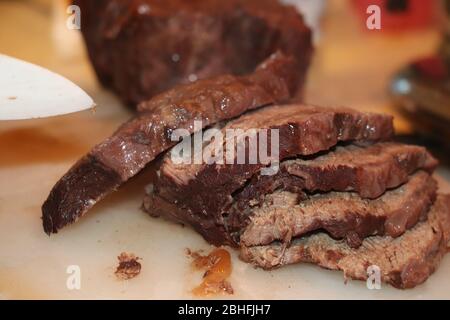 Boiled meat of veal and beef with vegetable sauce Stock Photo