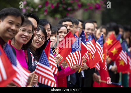Hanoi, Vietnam. 27th Feb, 2019. A crowd awaits the departure of President Donald J. Trump, following his meetings with Nguyen Xuan Phuc, Prime Minister of the Socialist Republic of Vietnam, at the Office of Government Hall Wednesday, Feb. 27, 2019, in Hanoi People: President Donald Trump Credit: Storms Media Group/Alamy Live News Stock Photo