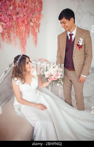 Happy young groom. His nationality is Tajik. Stock Photo